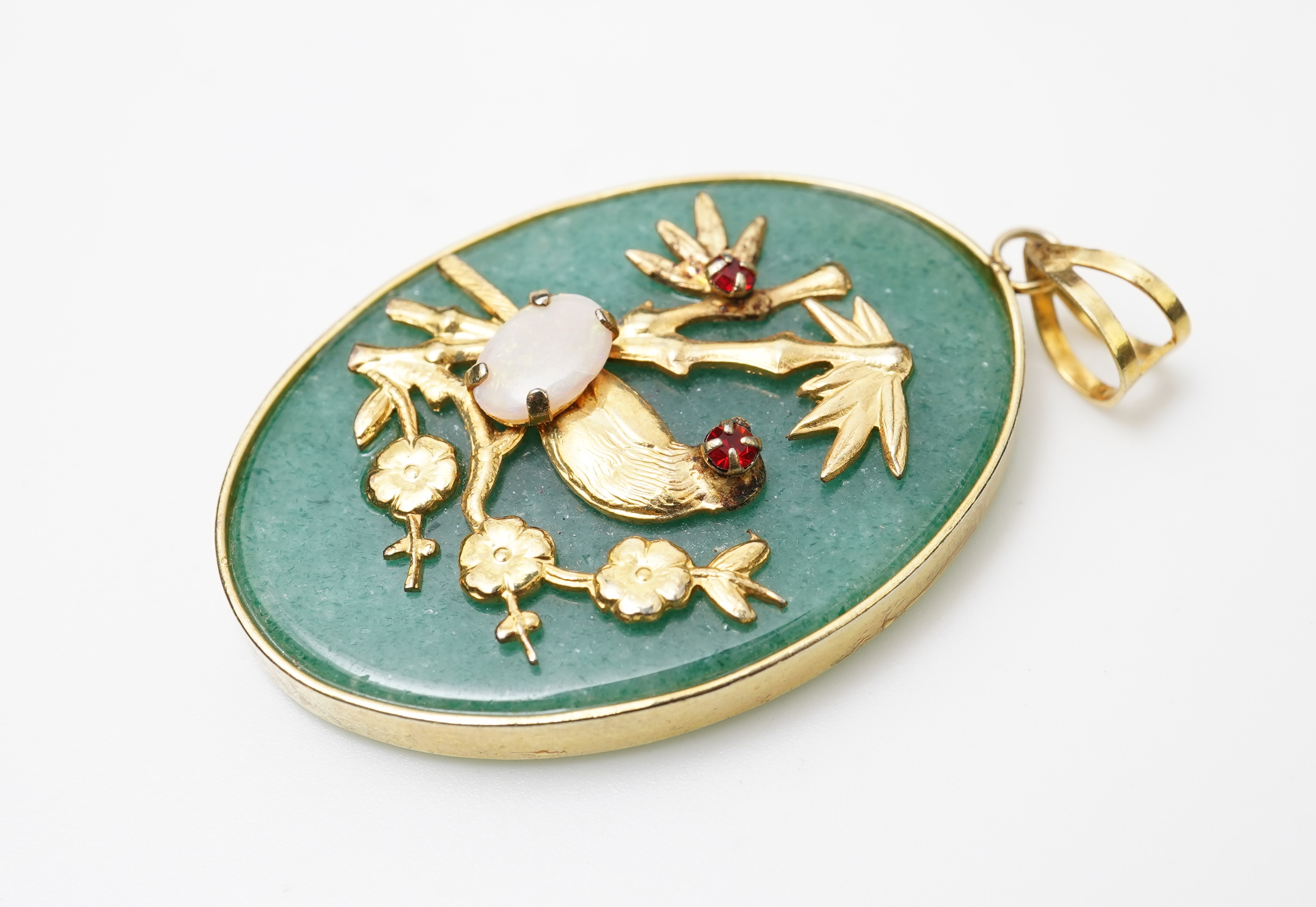 Two pendants and a pair of earrings